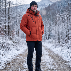 Cazel Men's Insulated Winter Puffer Jacket worn by a model on a snowy outdoor trail